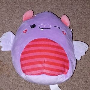 Purple and Red Plush Toy